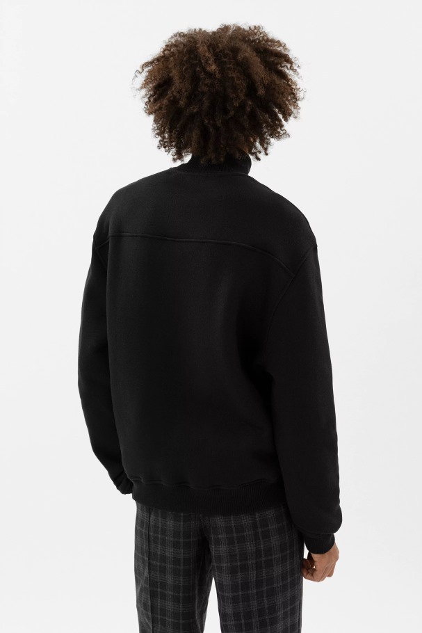 Axel Arigato Svart Fokus Genser Med Halv Glidelås