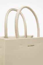 Axel Arigato Handlepose Medium Blek Beige - Bilde 2