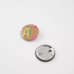 Rund Arigato Pin Camel Beige Axel Arigato