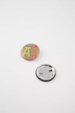 Rund Arigato Pin Camel Beige Axel Arigato